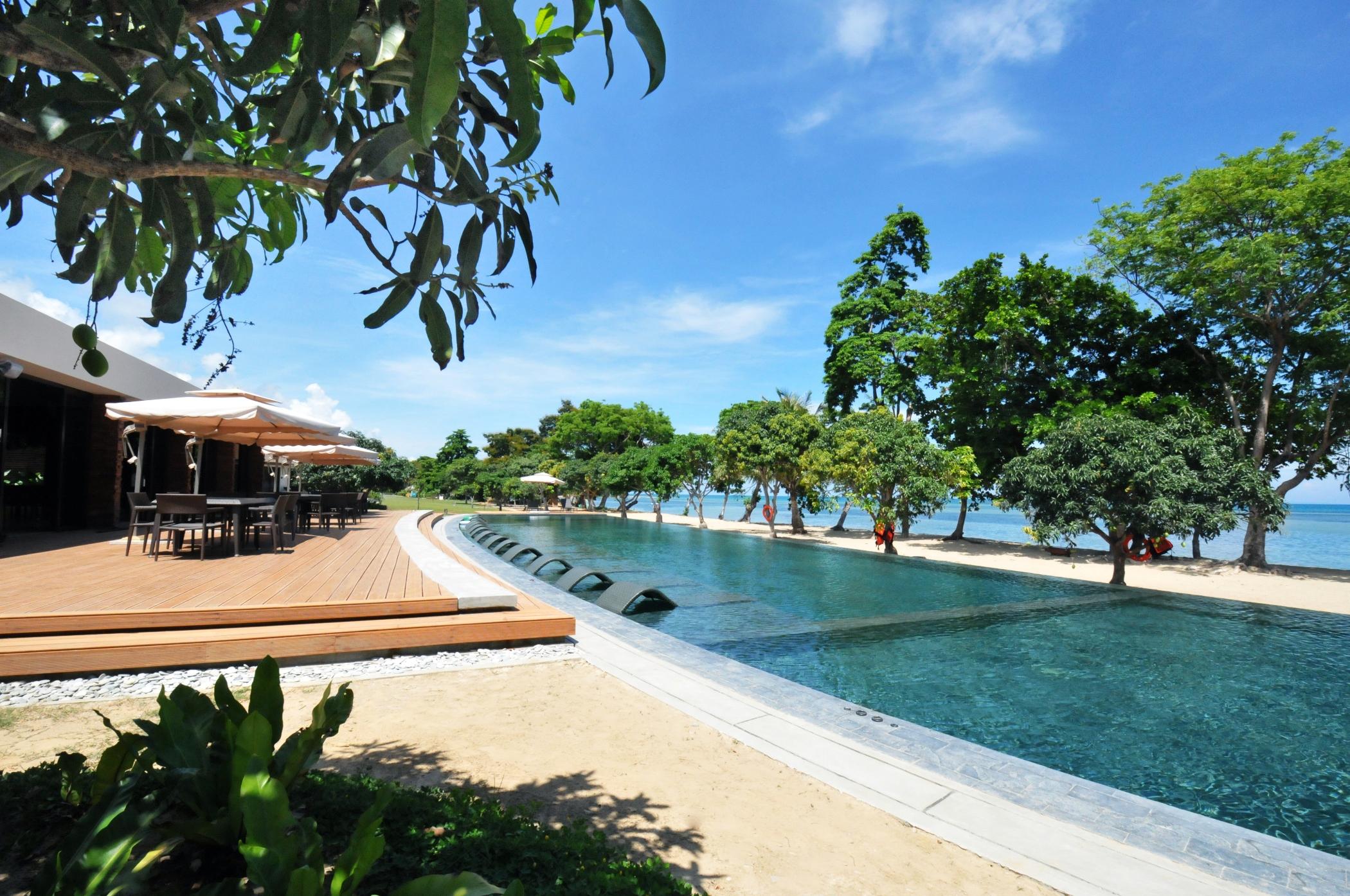 Astoria Palawan Hotel Puerto Princesa Ngoại thất bức ảnh The beach at the resort